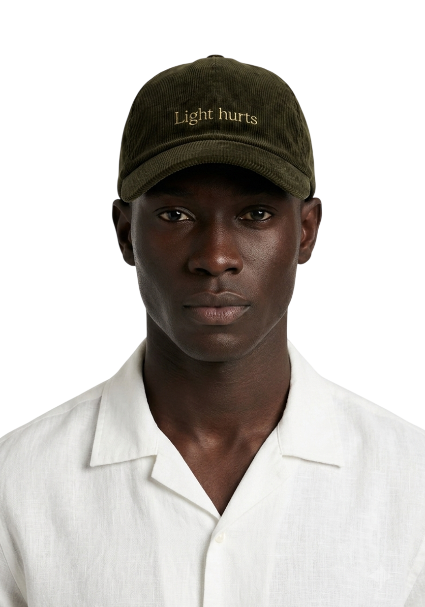 Ray of Light Light Hurts corduroy cap in Olive Green - model view